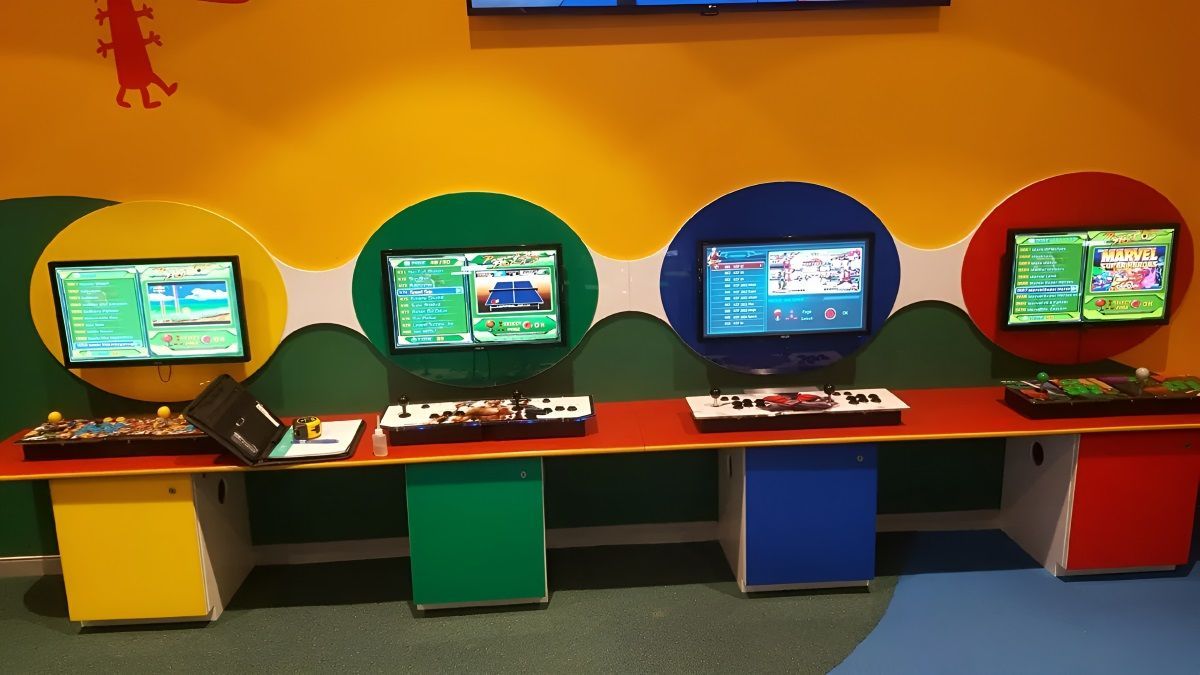 A Row Of Computer Monitors On A Table In A Room — Bent Plastics in Kunda Park, QLD