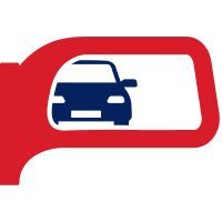 A car is reflected in a side view mirror.