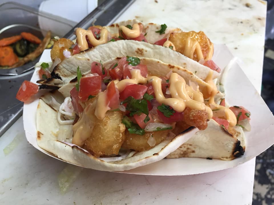 Tacos topped with chopped tomatoes — Rutland, MA — Off the Hook Roadside Eatery