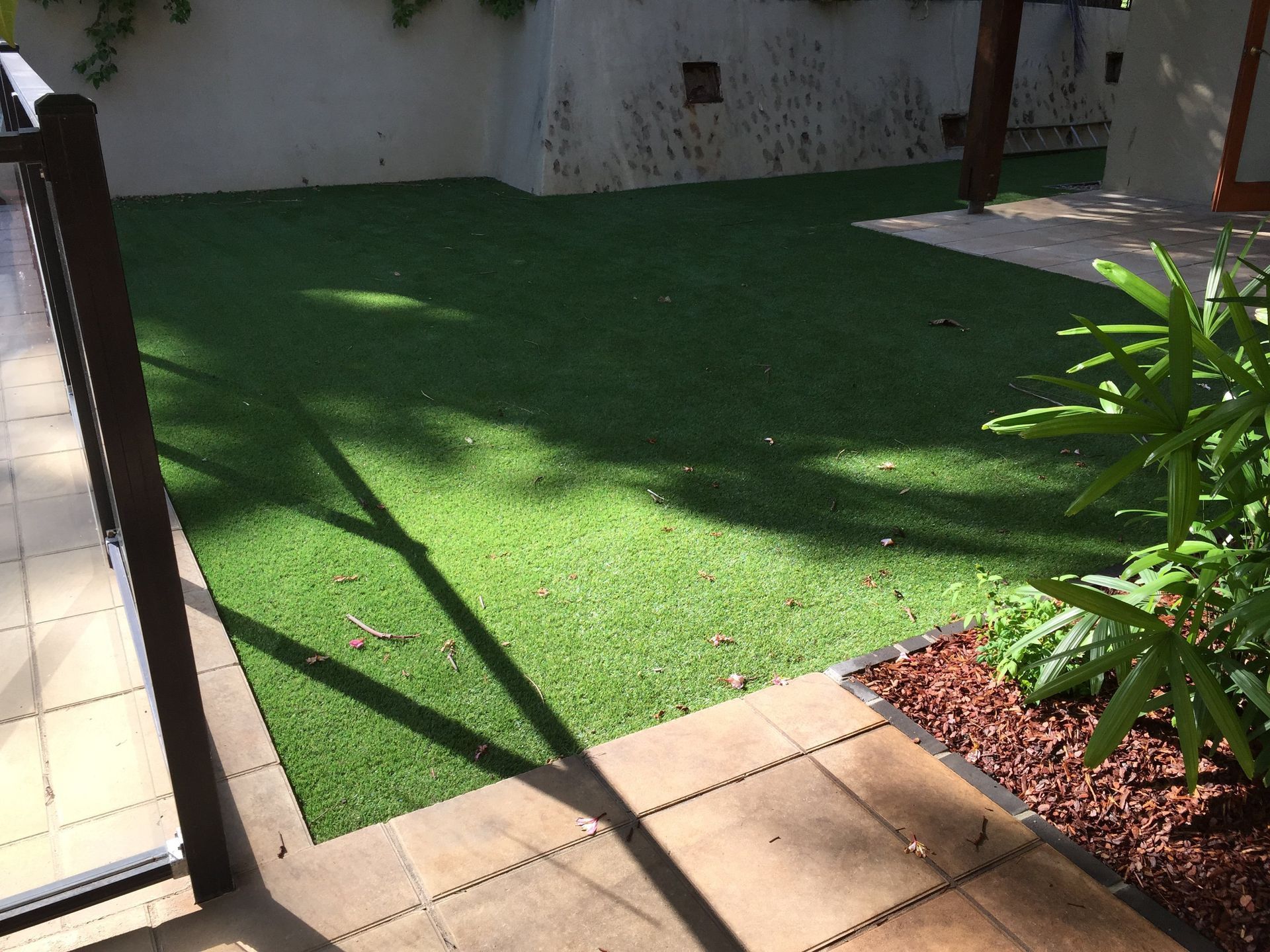Green Lawn With a Fence in the Background — Queensland, Australia — Jordin Sports Constructions