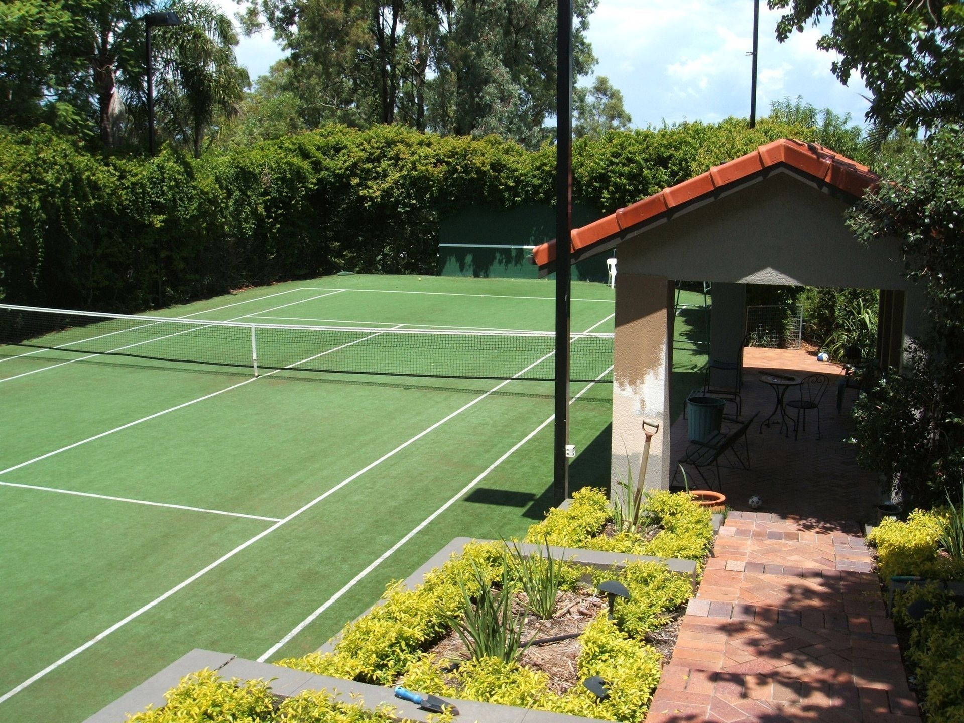 A Tennis Court with Stairs Leading Up — Queensland, Australia — Jordin Sports Constructions