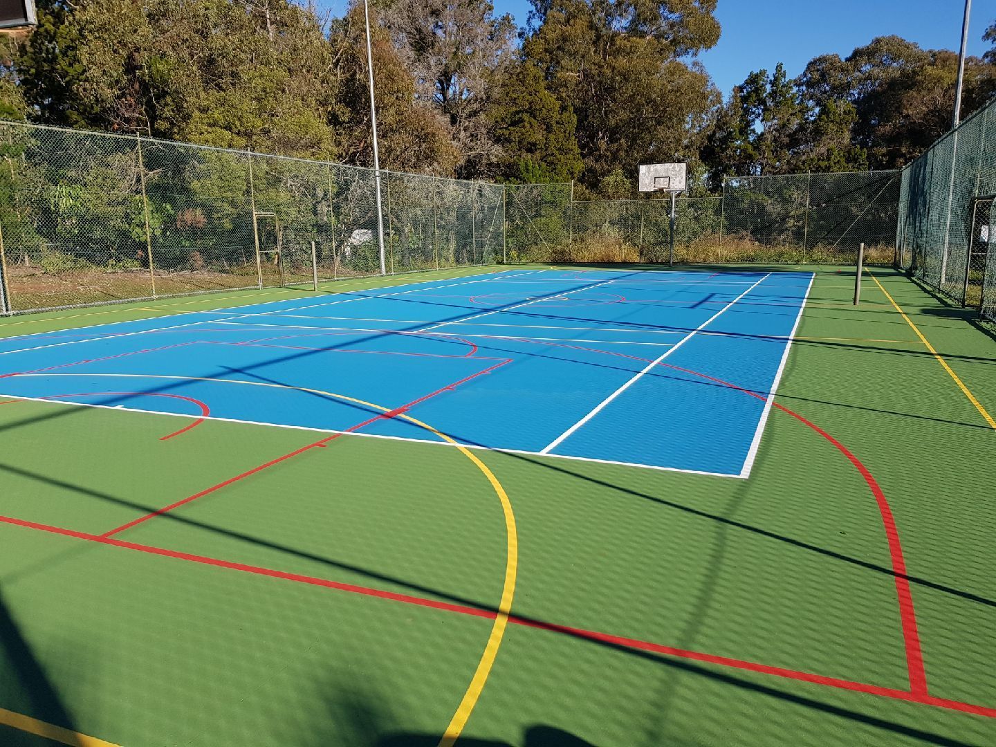 Blue and Green Basketball Court with a Fence — Queensland, Australia — Jordin Sports Constructions
