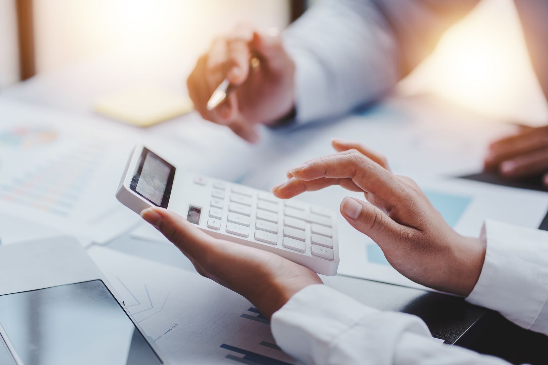 The financiers are calculating personal taxes for their customers.