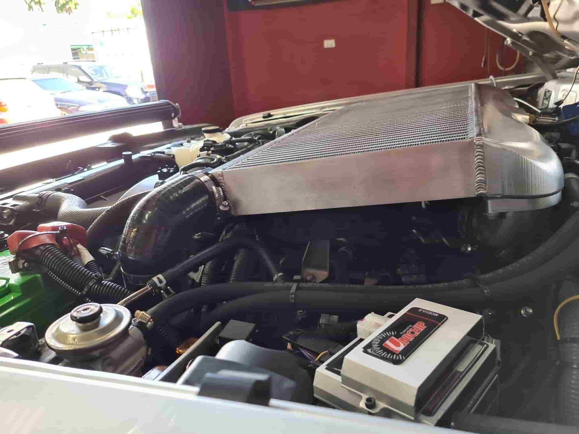 A Car Engine is Being Worked on in a Garage — SVS Auto Repairs & Dyno Tuning in Cairns, QLD