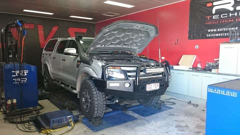 A Truck is Sitting in a Garage With Its Hood Open — SVS Auto Repairs & Dyno Tuning in Bungalow, QLD
