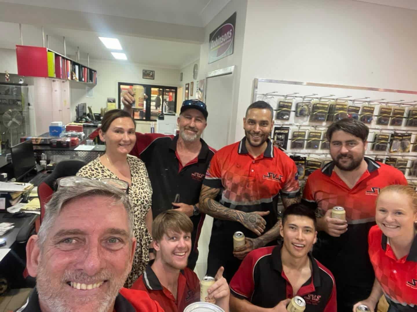 A Group of People Are Smiling — SVS Auto Repairs & Dyno Tuning in Bungalow, QLD