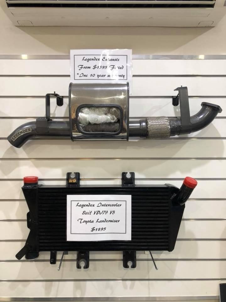 Two Radiators Are Hanging on a Wall Next to Each Other — SVS Auto Repairs & Dyno Tuning in Weipa, QLD