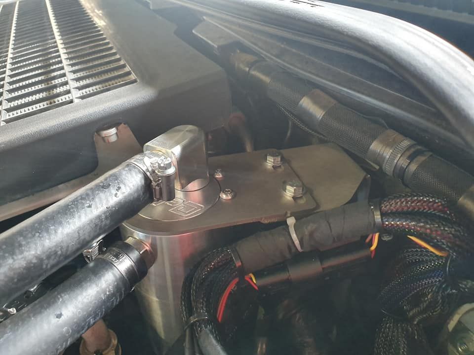 A Close Up of a Car Engine With a Lot of Wires Coming Out of It — SVS Auto Repairs & Dyno Tuning in Bungalow, QLD