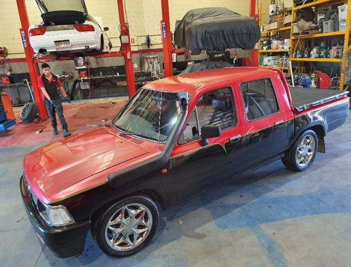 A Close Up of a Car Engine With a Lot of Wires Coming Out of It — SVS Auto Repairs & Dyno Tuning in Bungalow, QLD