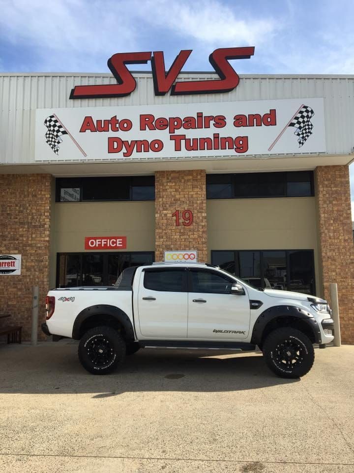 A White Truck is Parked in Front of a Building That Says Auto Repairs and Dyno Tuning — SVS Auto Repairs & Dyno Tuning in Bungalow, QLD