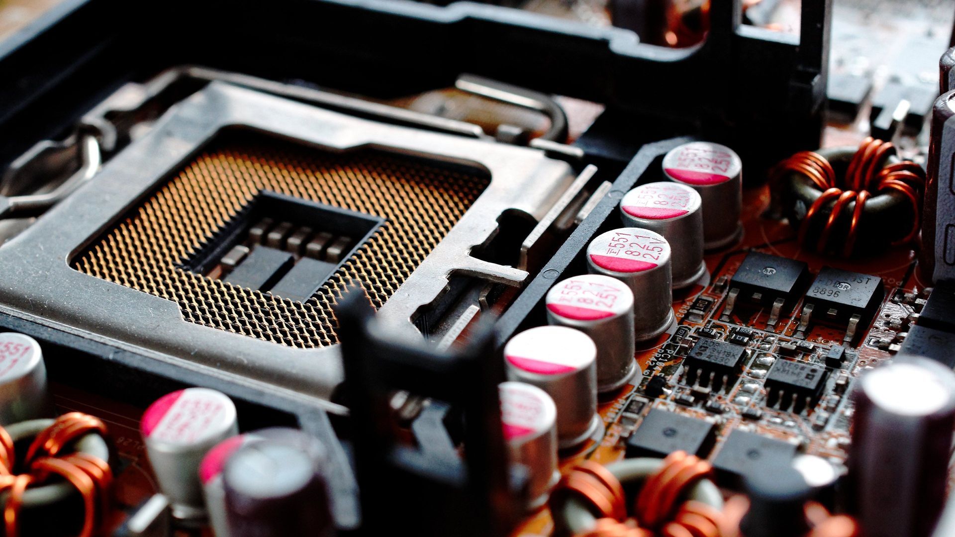 A close up of a computer motherboard with ram slots