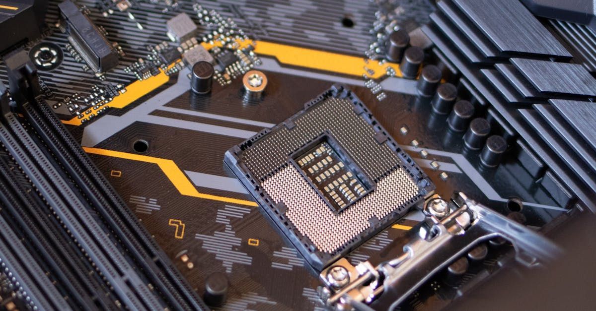 A close up of a motherboard with a cpu on it.
