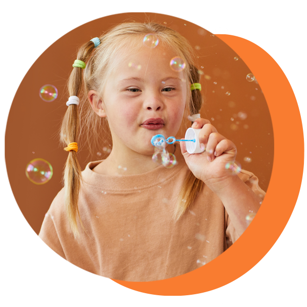 Girl blowing bubbles