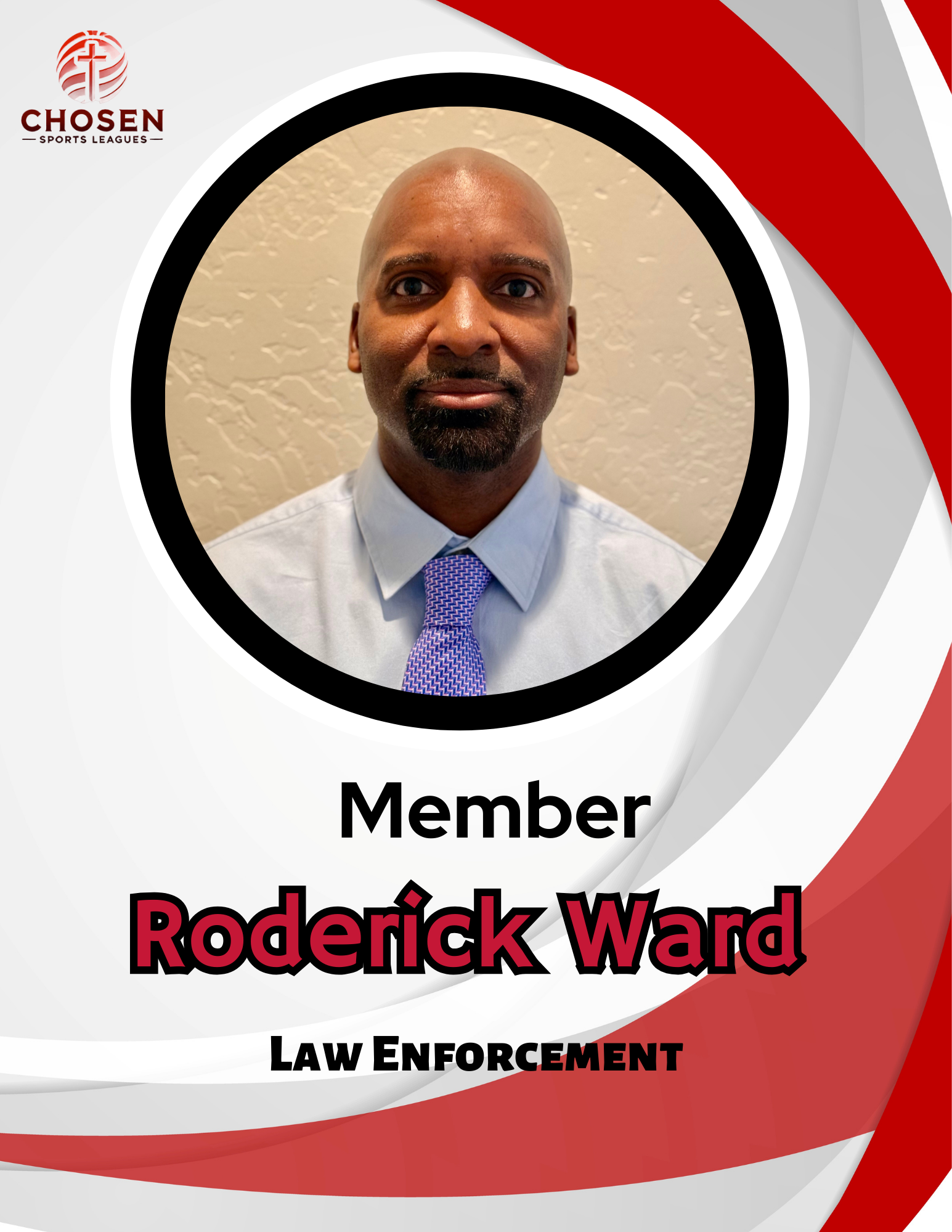 Football coach with arms crossed, standing on a football field. He wears a navy polo shirt and gray pants.