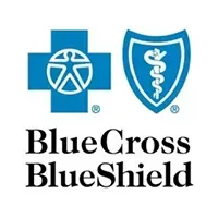 A blue cross blue shield logo with a cross and shield on a white background.
