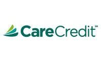 The logo for carecredit is green and white with a green leaf.