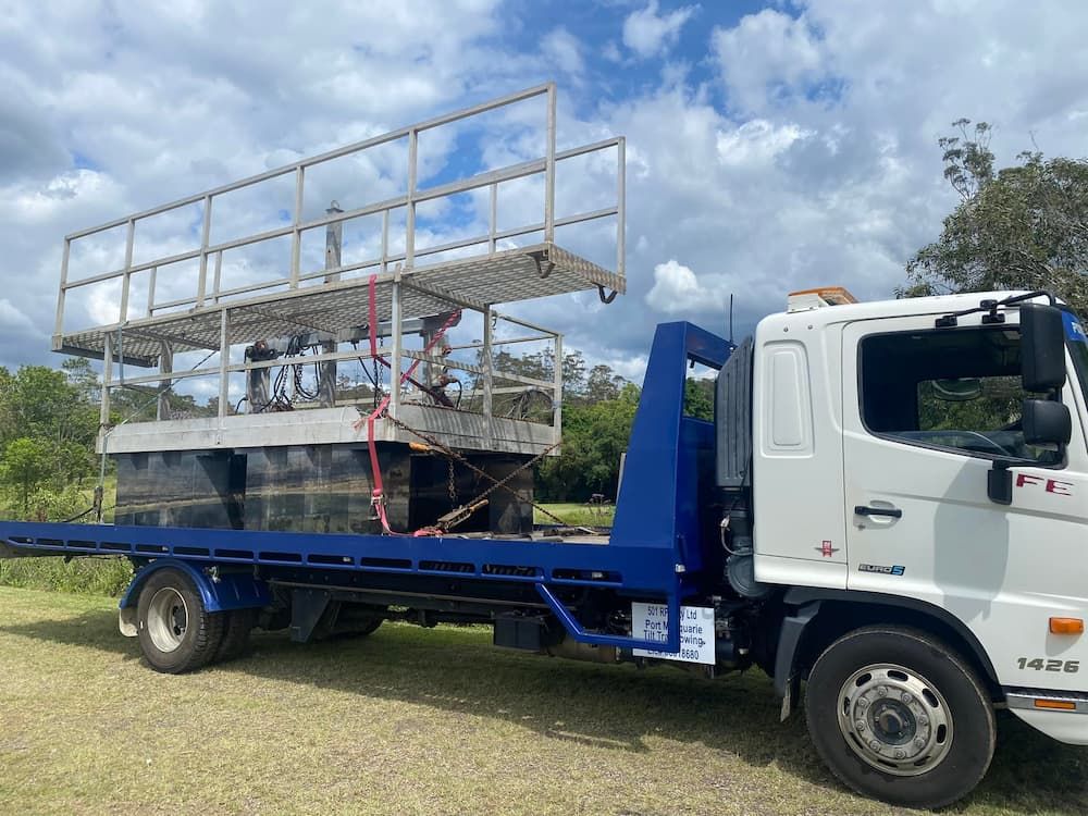Mining Equipments Installed on a Truck— Port Macquarie Tilt Tray Towing in Telegraph Point, NSW