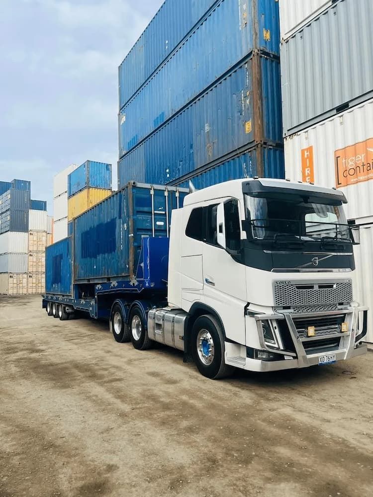 Truck Hauling Two Containers — Port Macquarie Tilt Tray Towing in Telegraph Point, NSW