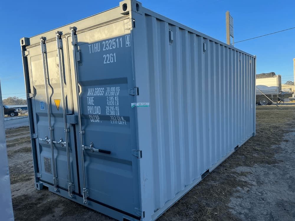 Grey Cargo Container in the Yard — Port Macquarie Tilt Tray Towing in Telegraph Point, NSW