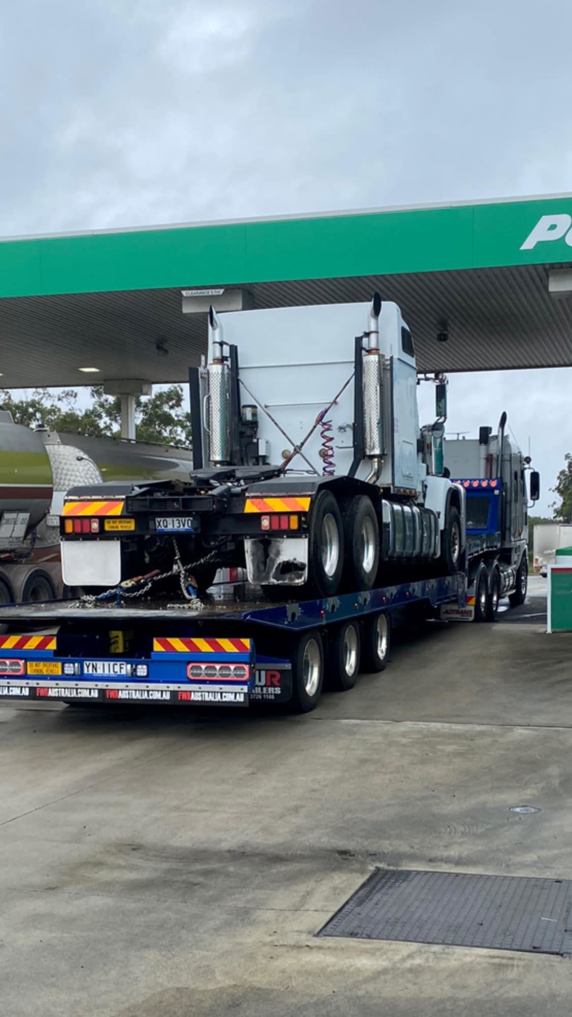 A Semi Truck is Parked at a Gas Station — Port Macquarie Tilt Tray Towing in Coffs Harbour, NSW