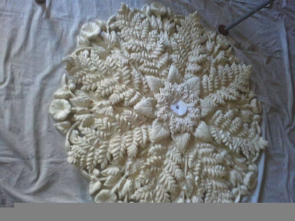 A piece of bread with a flower design on it