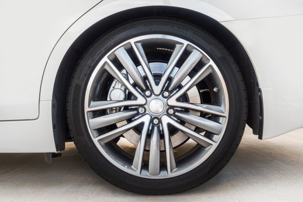 Car Tyre with Shiny Mags — Complete Tyre Management Services in Paget, QLD