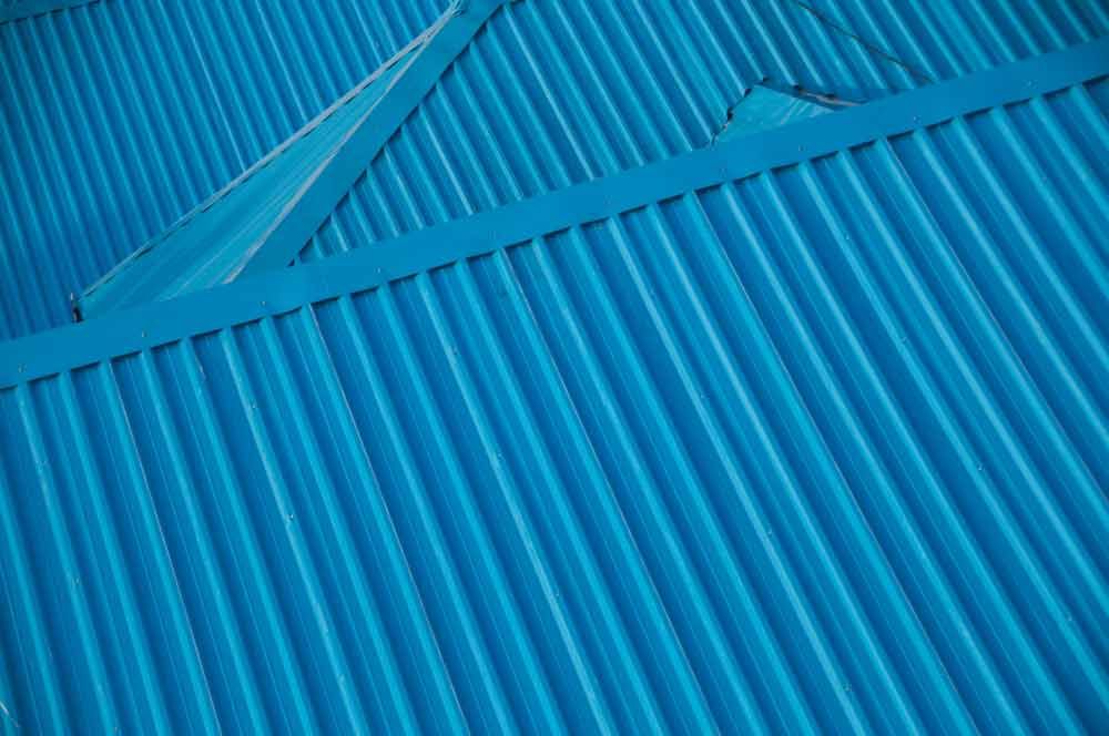 Blue Metal Roof — Ricky Jenner Plumbing, Roofing & Guttering in Wollongb