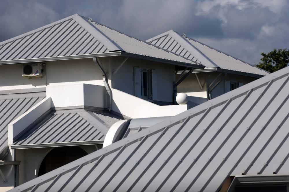 Multiple Houses With Grey Roofs — Ricky Jenner Plumbing, Roofing & Guttering in Wollongb