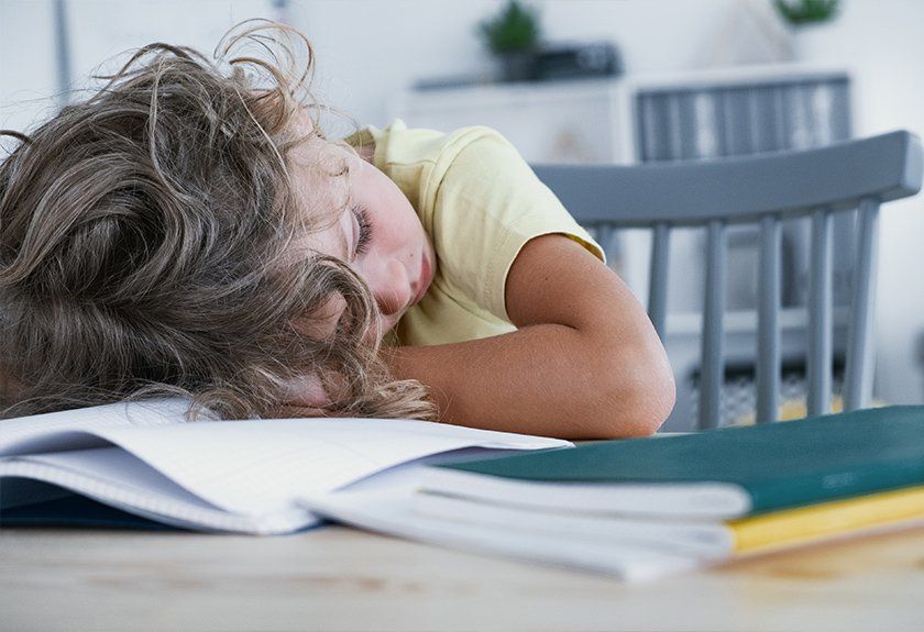 woman has trouble sleeping and husband is snoring