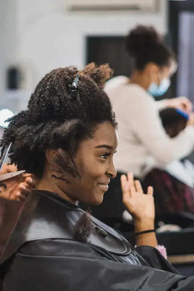 Hairdresser Dyeing Client's Hair — Silver Sping, MD — Montgomery Beauty School