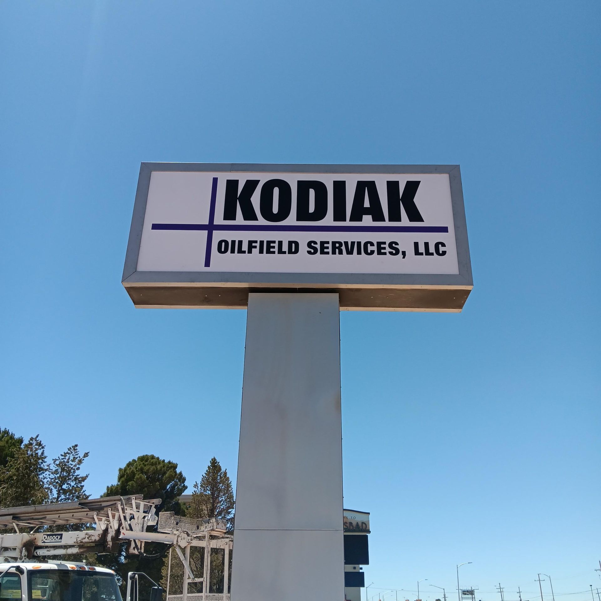 A large sign for kodiak oilfield services llc