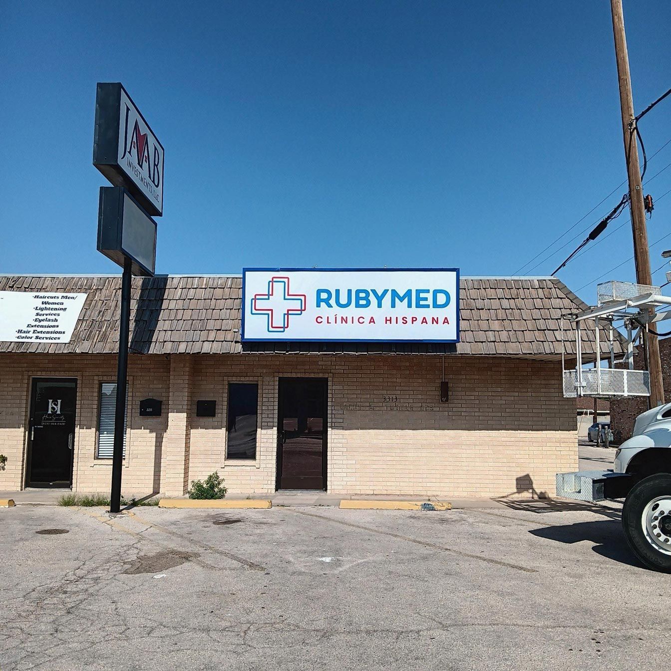 A building with a sign that says rubymed on it