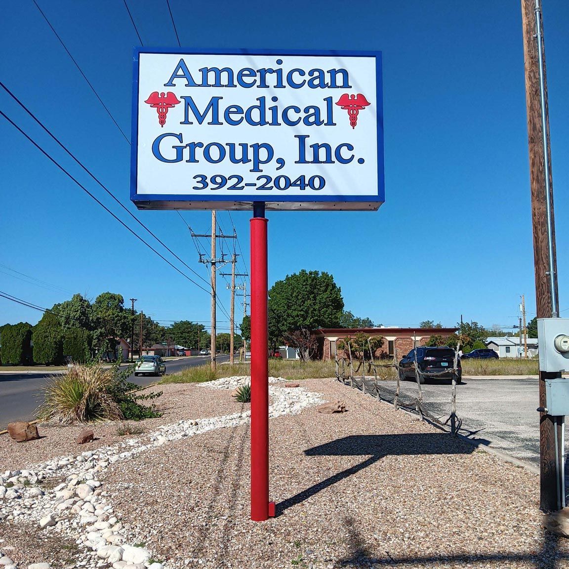A sign that says american medical group inc. on it