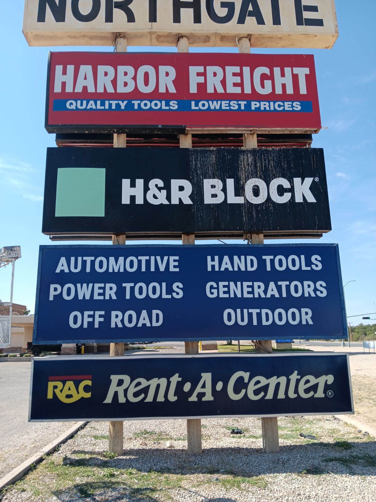A sign for harbor freight and h & r block