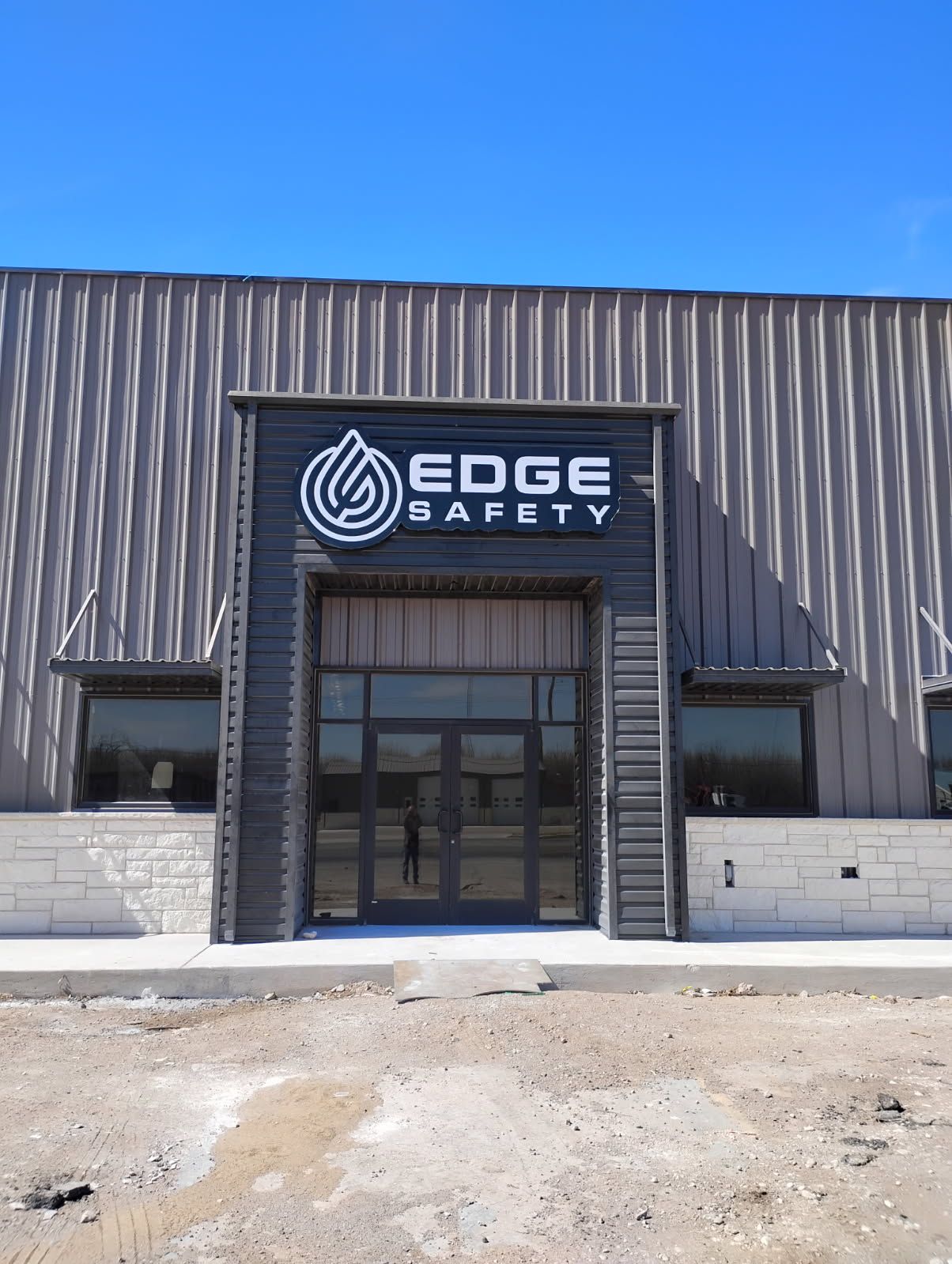 A building with a sign that says edge safety on it