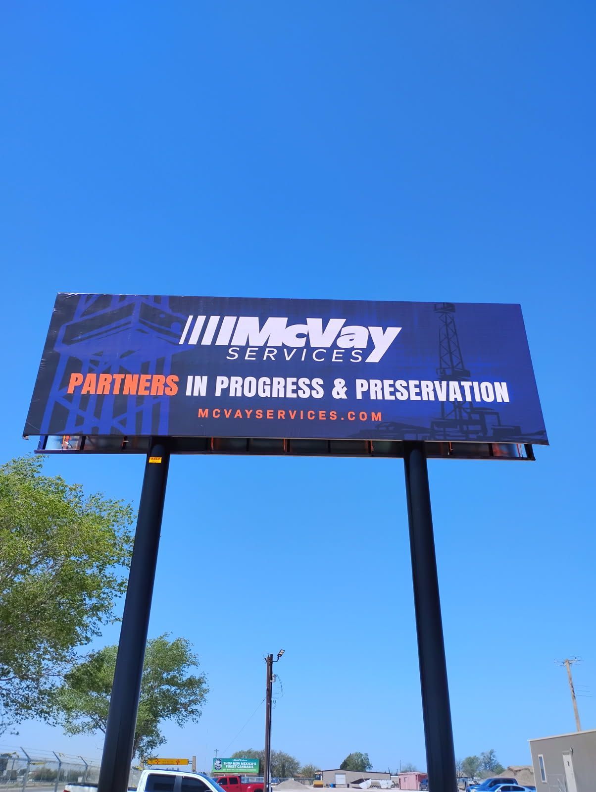 A billboard for mcvay services partners in progress and preservation