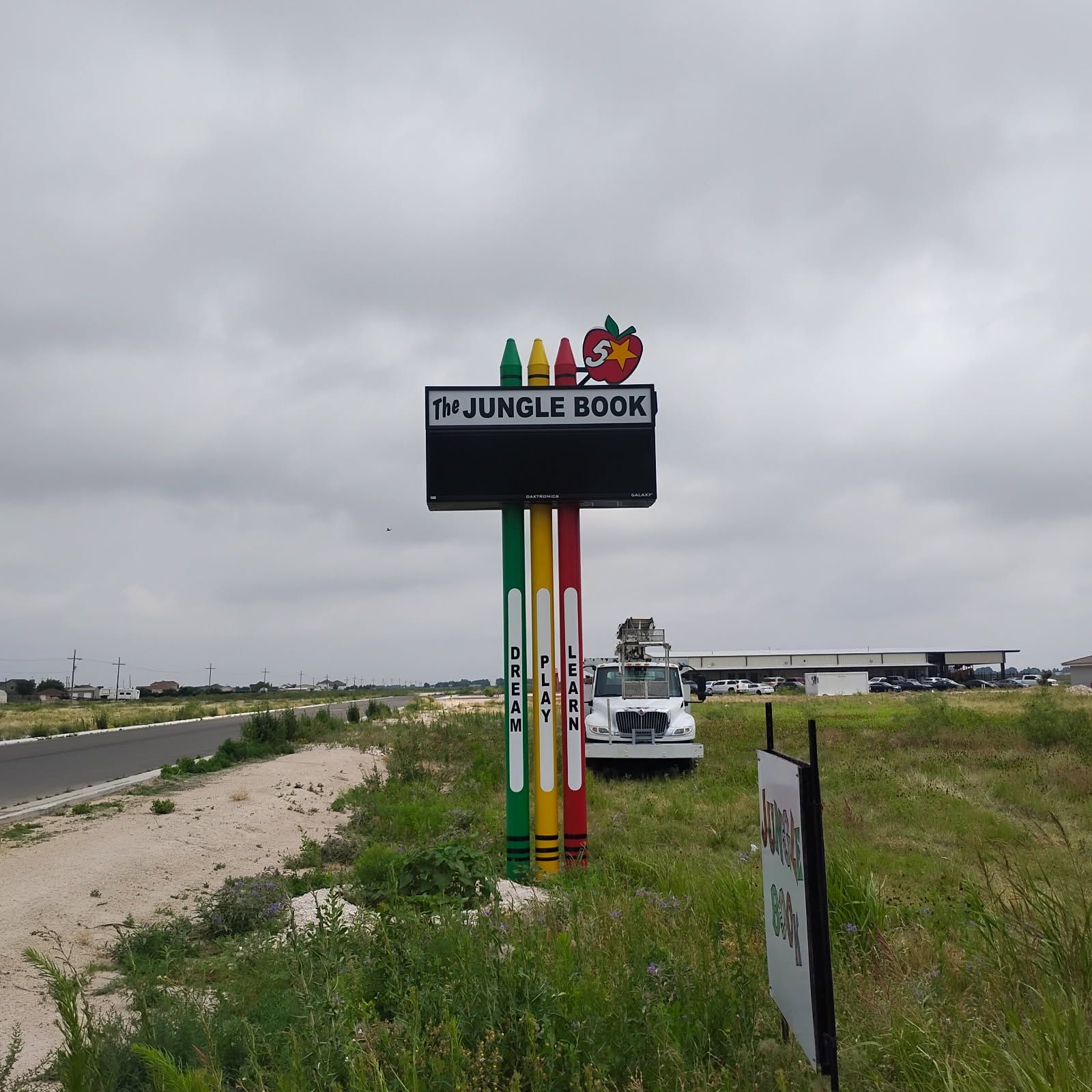 A sign that says jungle book on it