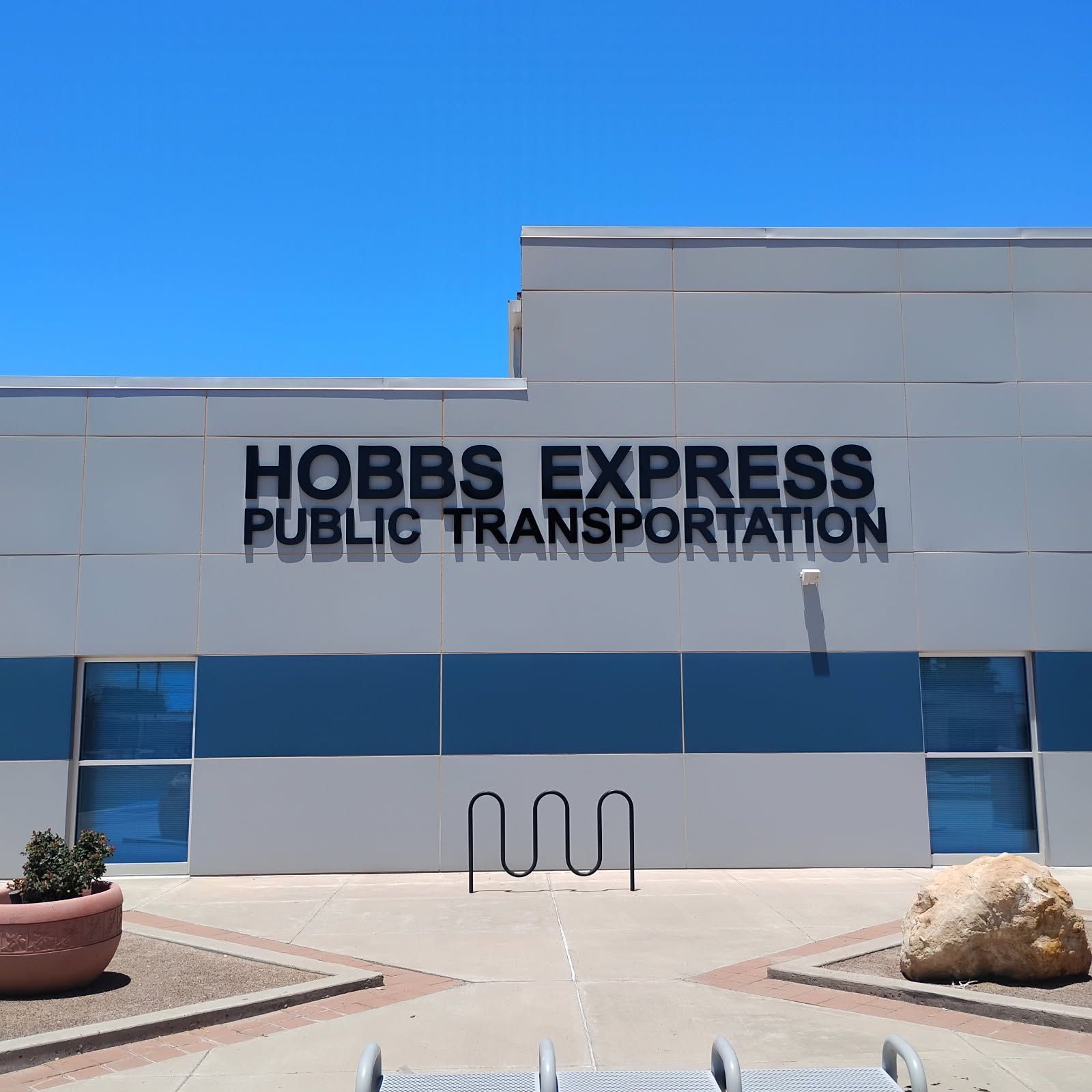 Hobbs express public transportation building with a blue sky in the background
