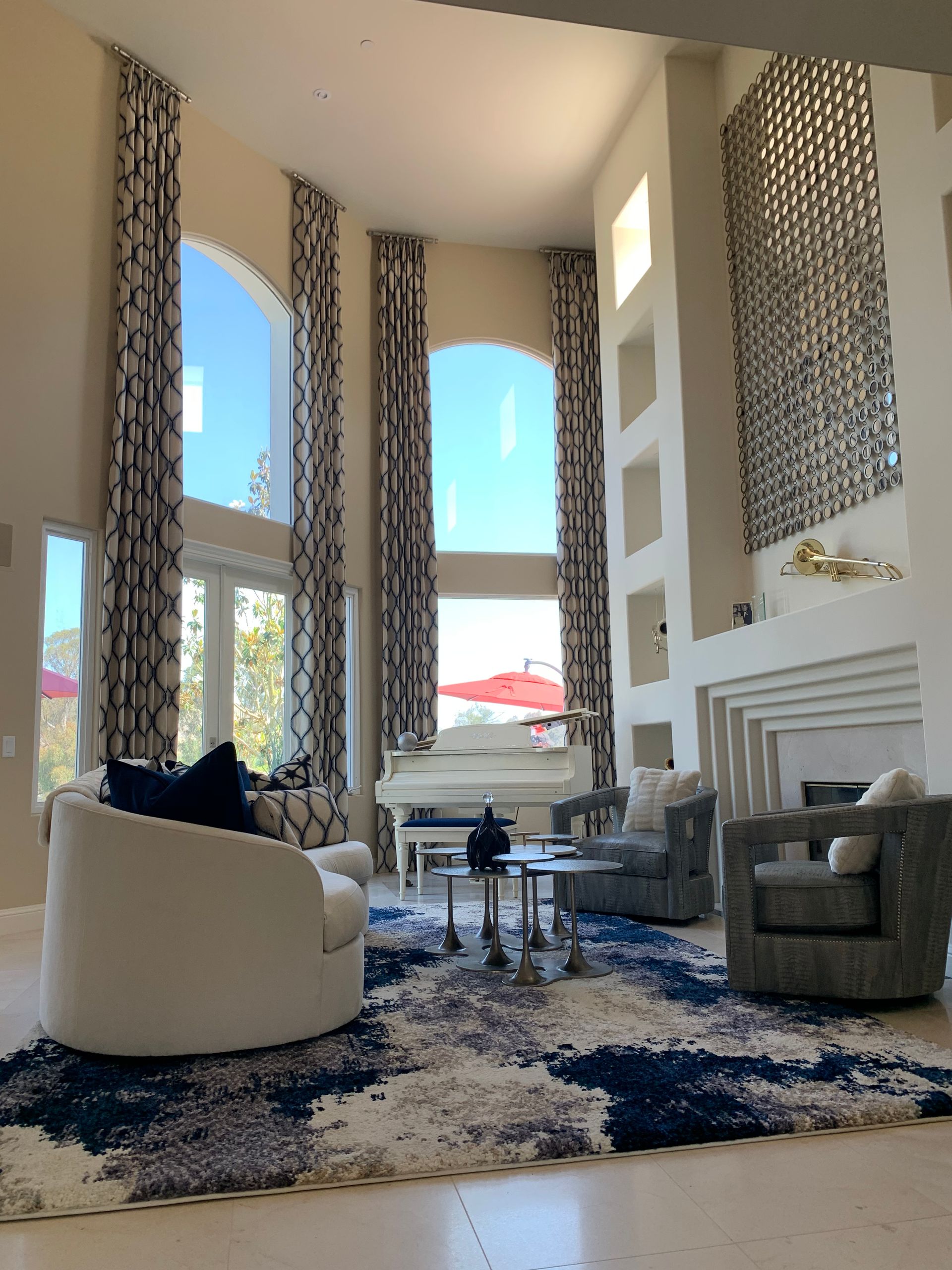 A living room filled with furniture and a fireplace