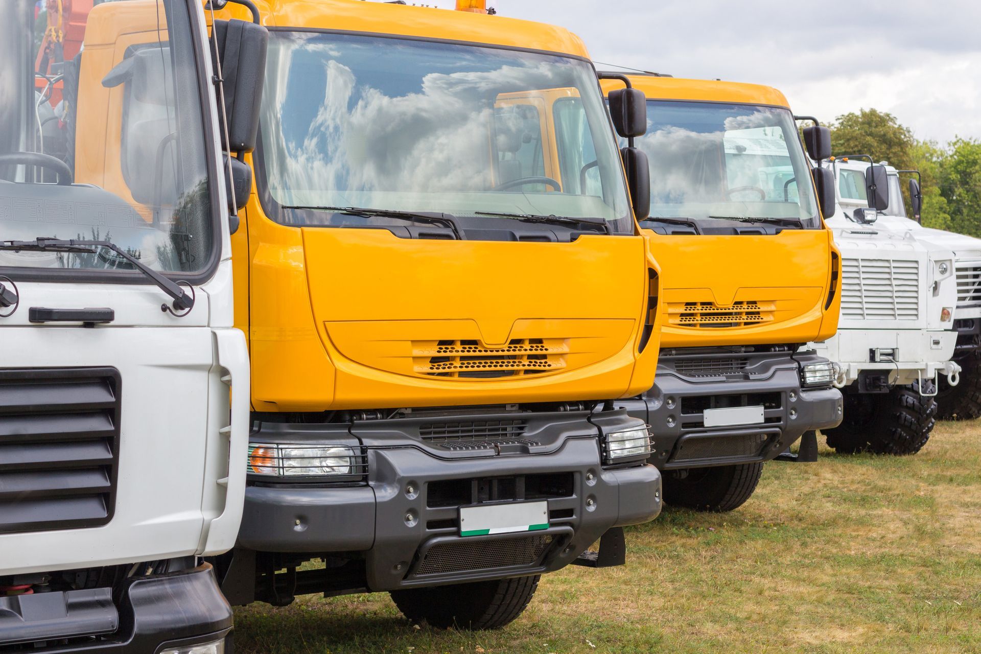 Yellow Trucks — Port Angeles, WA — Evergreen Collision Centers