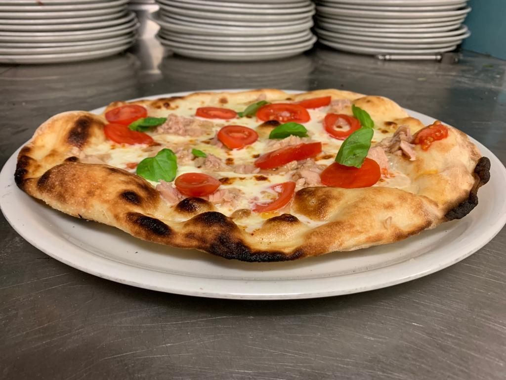 pizza pomodorini e rucola