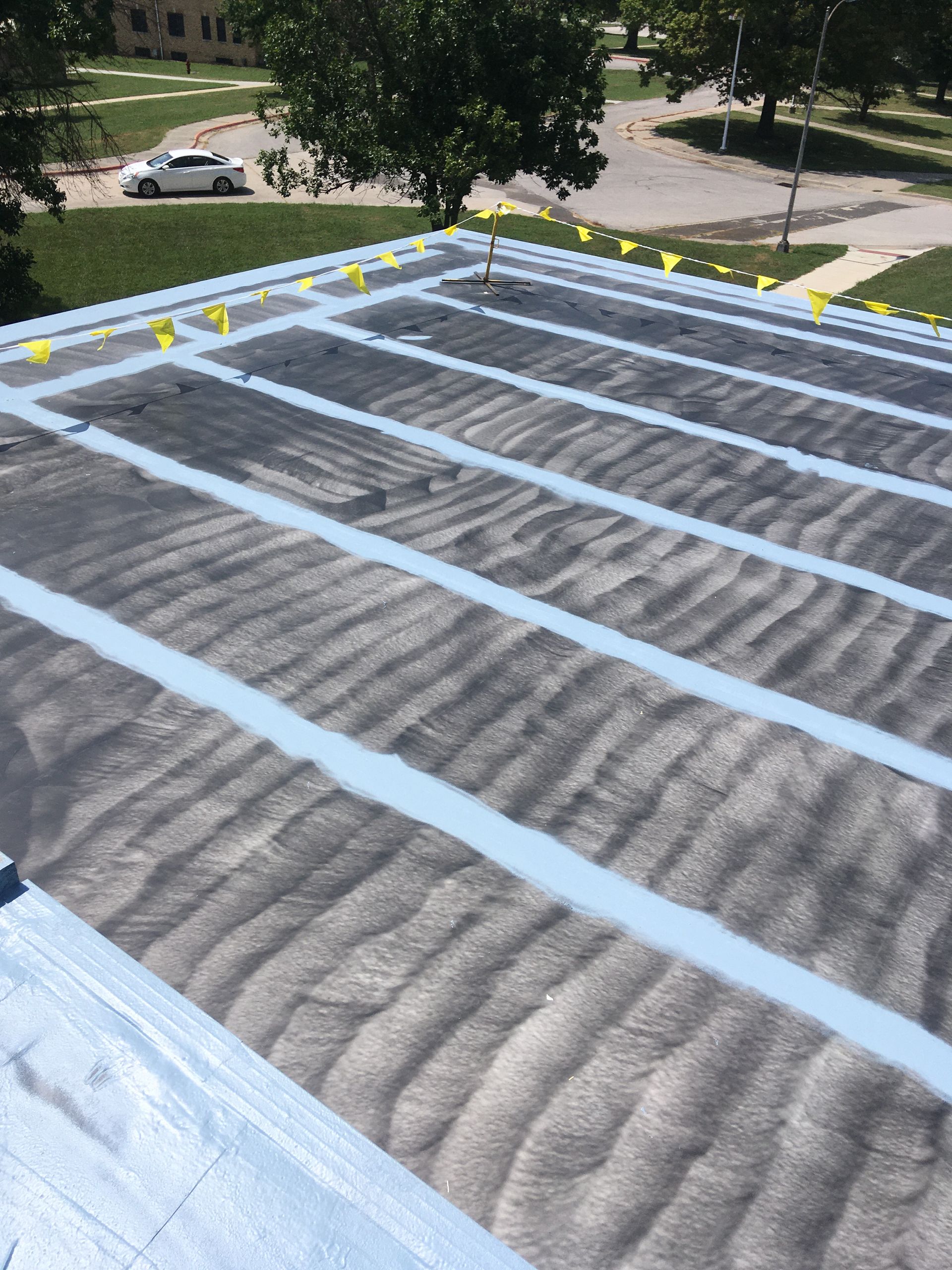 A roof with a lot of blue stripes on it