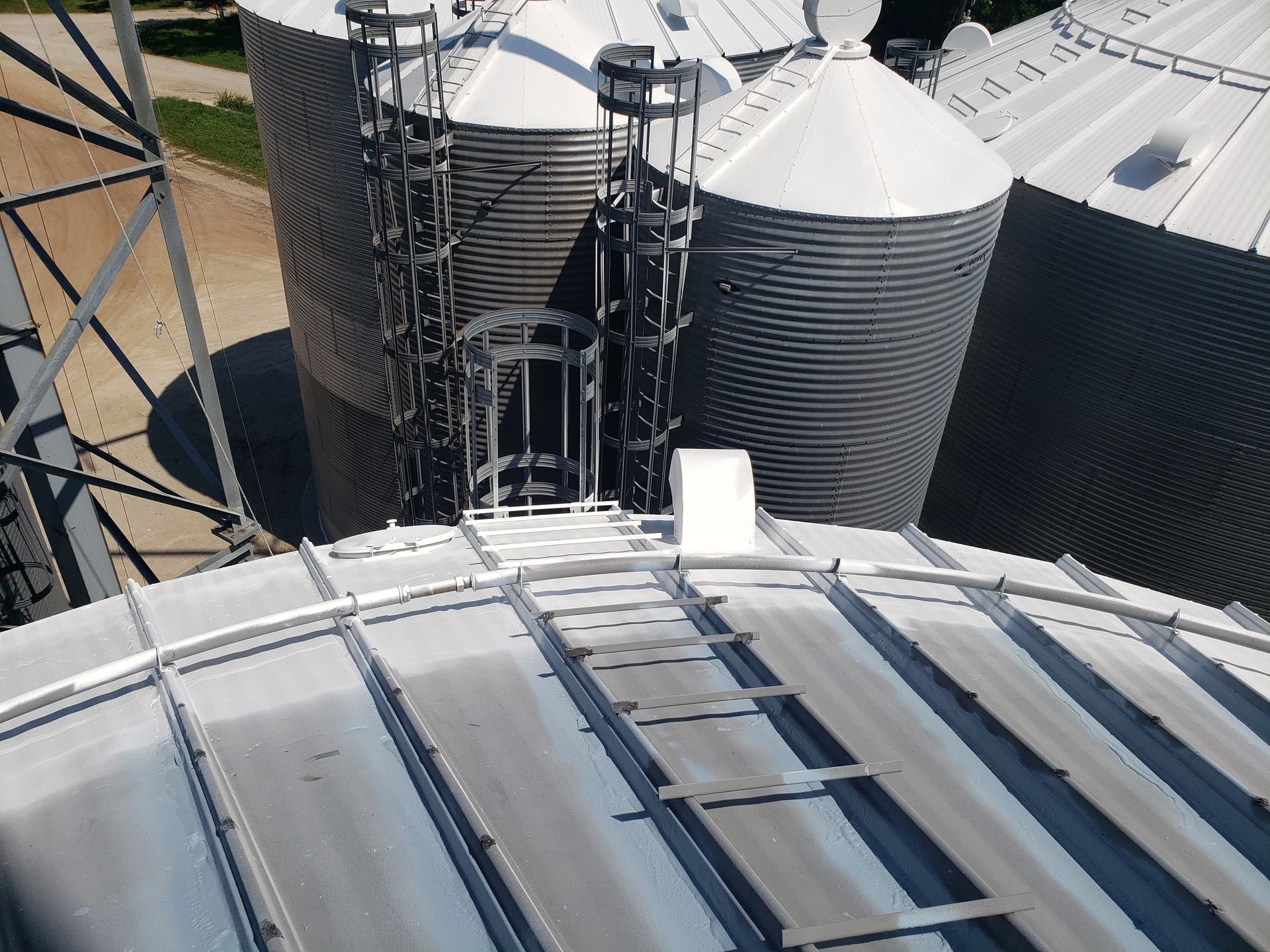 An aerial view of a silo with stairs leading up to it
