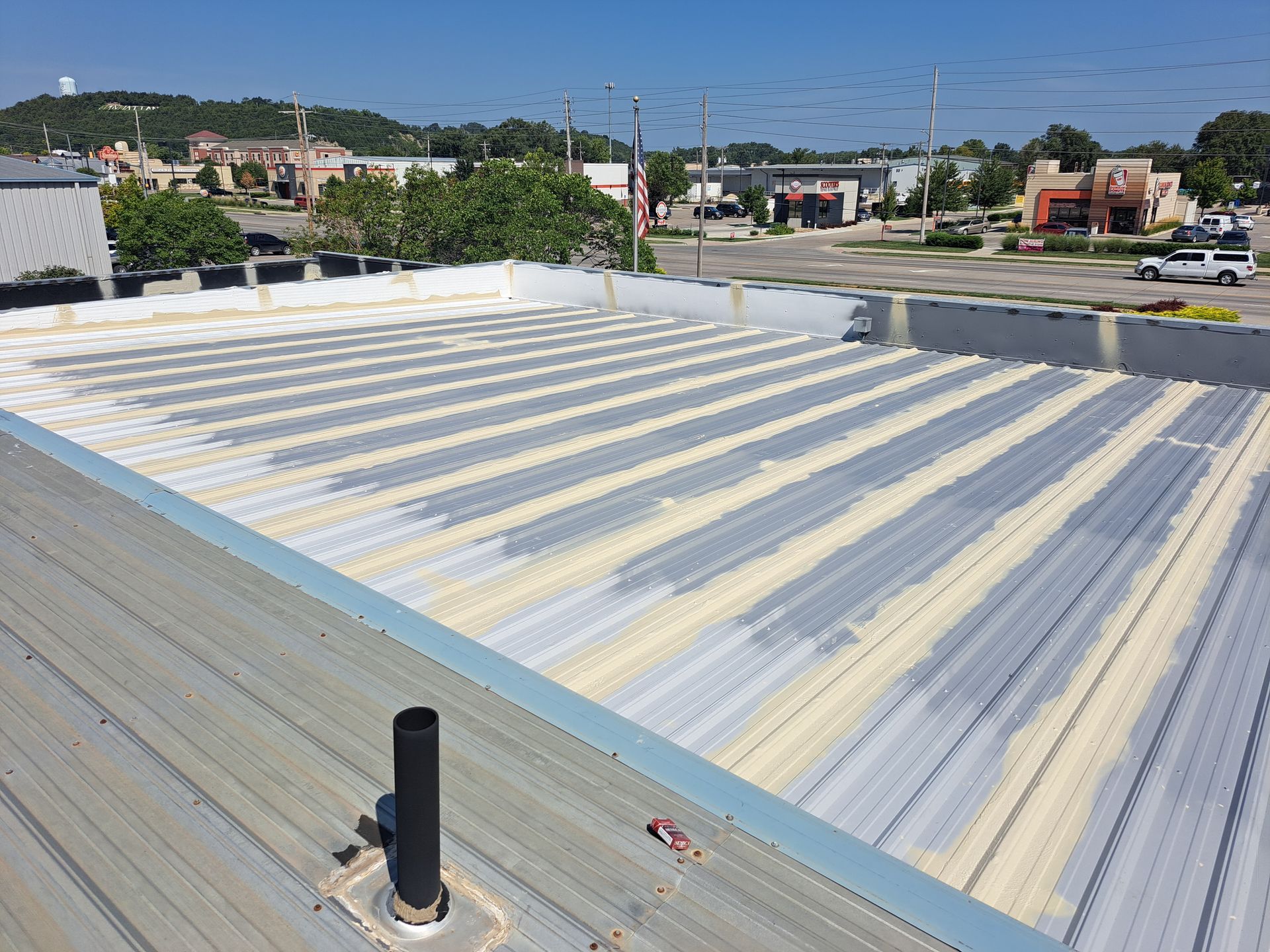 The roof of a building with a chimney on it