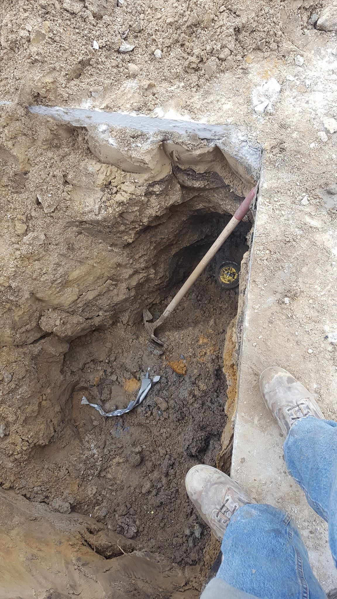 Digging Hole with Shovel — Port Huron, MI —  Modern Sewer & Drain Cleaning