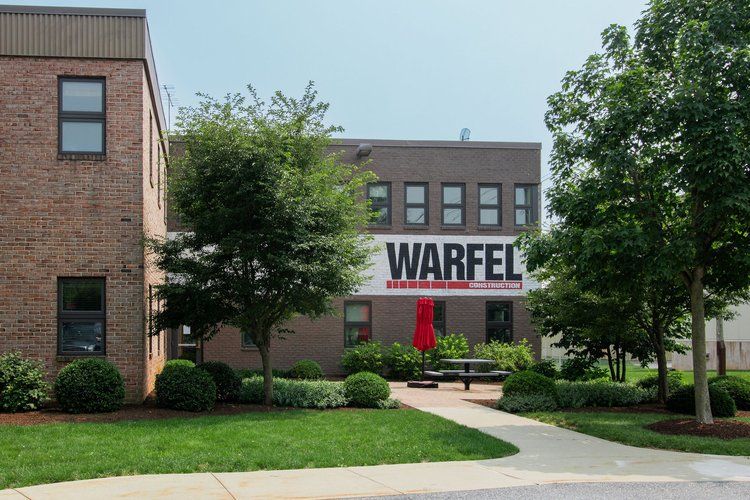 A large brick building with the word warfel on it