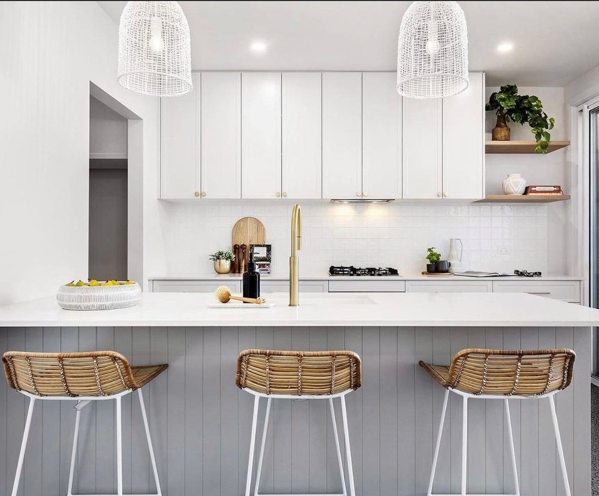 A Small Kitchen with Island, Sink and Stove — Inovative Interiors In Cardiff, NSW