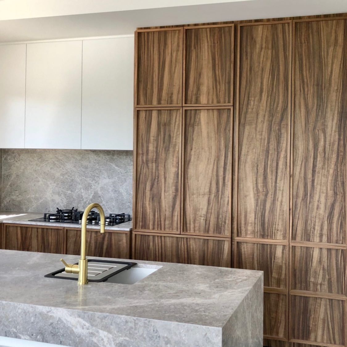 Modern Kitchen With Marble Countertops