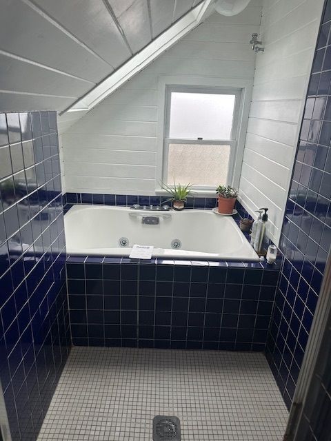 Cast iron tub installation by Kirkland and Shaw