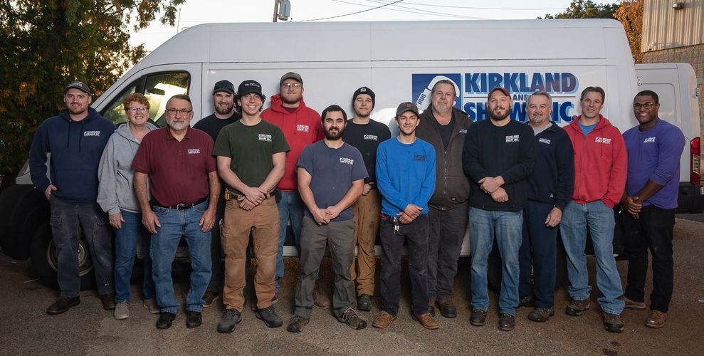 Team of plumbers from Kirkland and Shaw